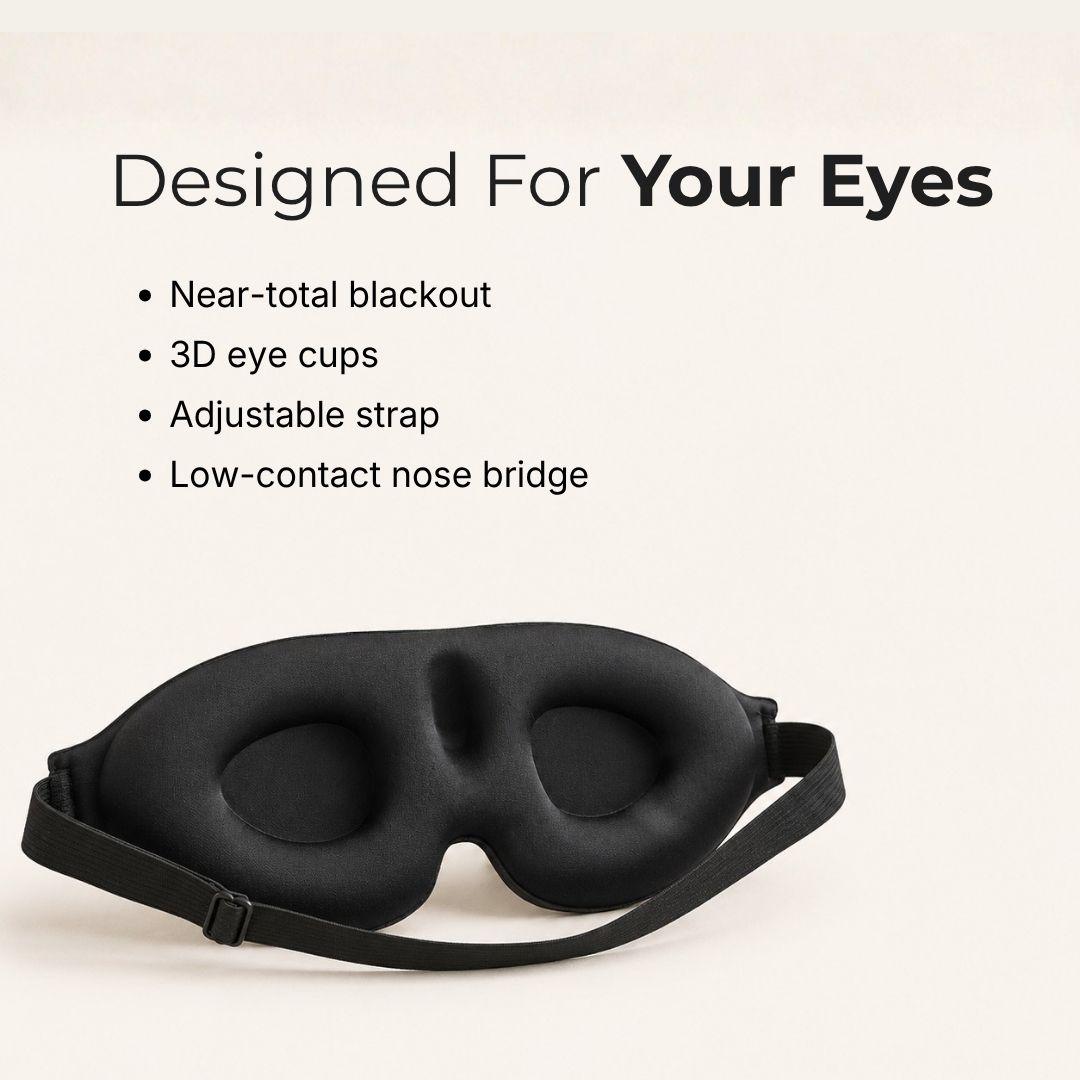 Black sleep mask with an adjustable strap, shown on a light beige background with text highlighting key features like near-total blackout, 3D eye cups, and adjustable strap.