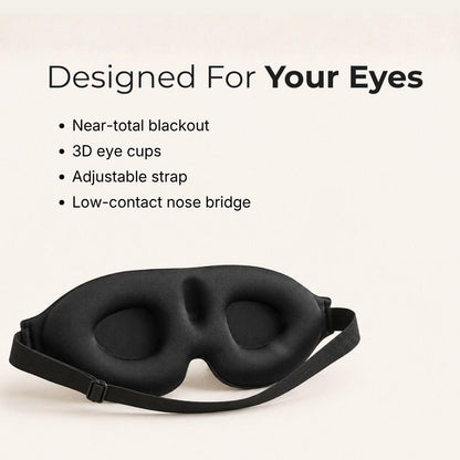 Black sleep mask with an adjustable strap, shown on a light beige background with text highlighting key features like near-total blackout, 3D eye cups, and adjustable strap.